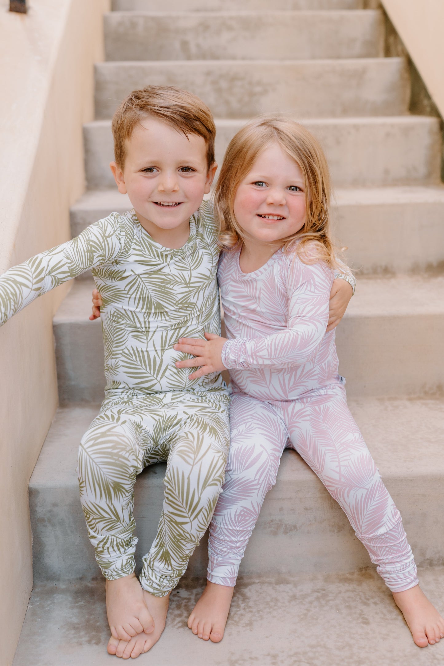 Shae & Palmer Cali Coastal Collection — bamboo toddler pajamas in Pink palm leaf print. Ultra-soft, breathable two-piece sleepwear for baby and toddler girls, inspired by laid-back California beach vibes.
