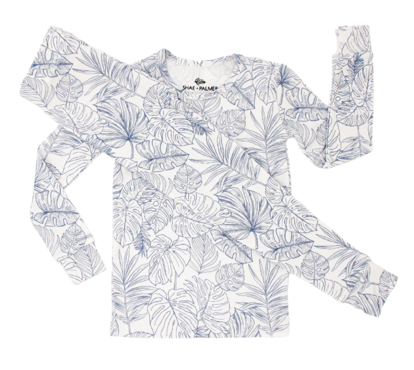 Transform your toddler’s bedtime with the luxuriously soft Tropical Bliss two-piece pajama set! Featuring a breezy palm leaf design, this set captures the essence of tropical escapes with its playful and vibrant vibe, adding a fresh twist to your little one’s nightly routine. Crafted from eco-friendly bamboo fabric, the Tropical Bliss set is ultra-soft, breathable, and gentle on sensitive skin. Bamboo’s natural temperature-regulating and moisture-absorbing properties help keep your toddler cool in warmer we