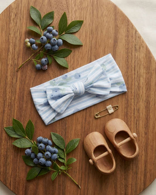 Blueberry Lane bamboo baby headband paired with matching baby pajamas