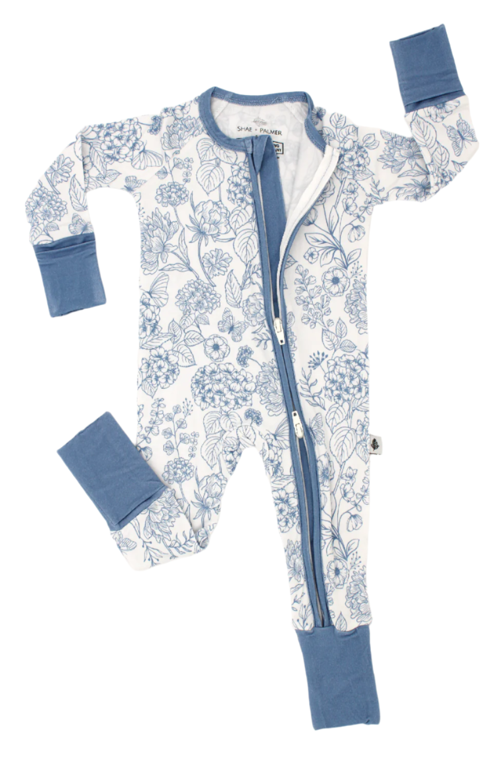 Soft bamboo baby zip romper in Botanical Blue floral print, designed by Shae & Palmer for eco-conscious parents seeking luxury and comfort.