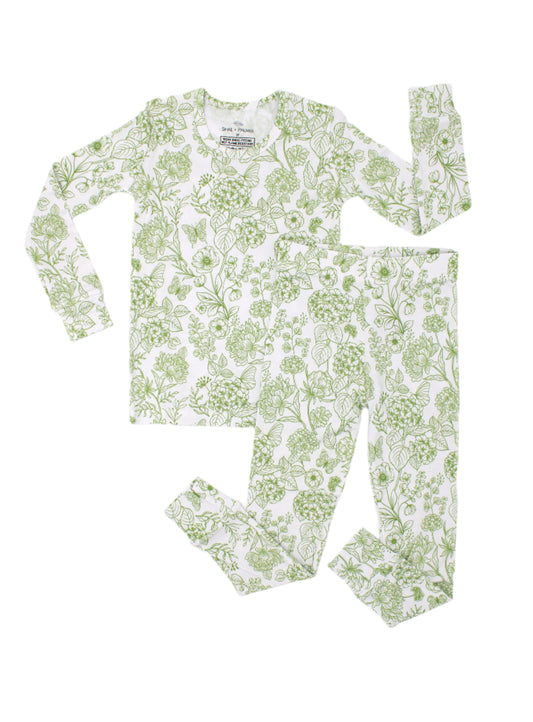 Shae & Palmer’s Botanical Moss Green kids pajama set features a calming green floral print on sustainable bamboo fabric, crafted for breathability, softness, and all-night comfort in a classic two-piece design.