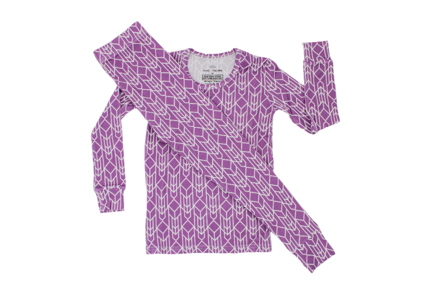 Shae & Palmer Runway Collection - bamboo toddler pajamas in bold Purple geometric print. Soft, breathable two-piece pajama set designed for stylish baby and toddler girls to sleep and play in comfort.