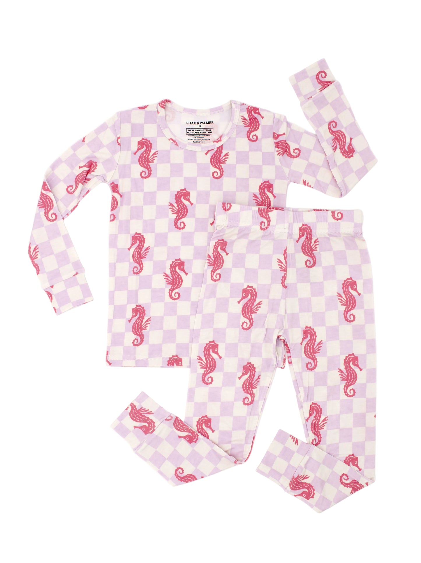 Seahorse Splash toddler bamboo pajamas by Shae & Palmer with coral pink seahorses on lavender checkerboard, ultra-soft breathable fabric