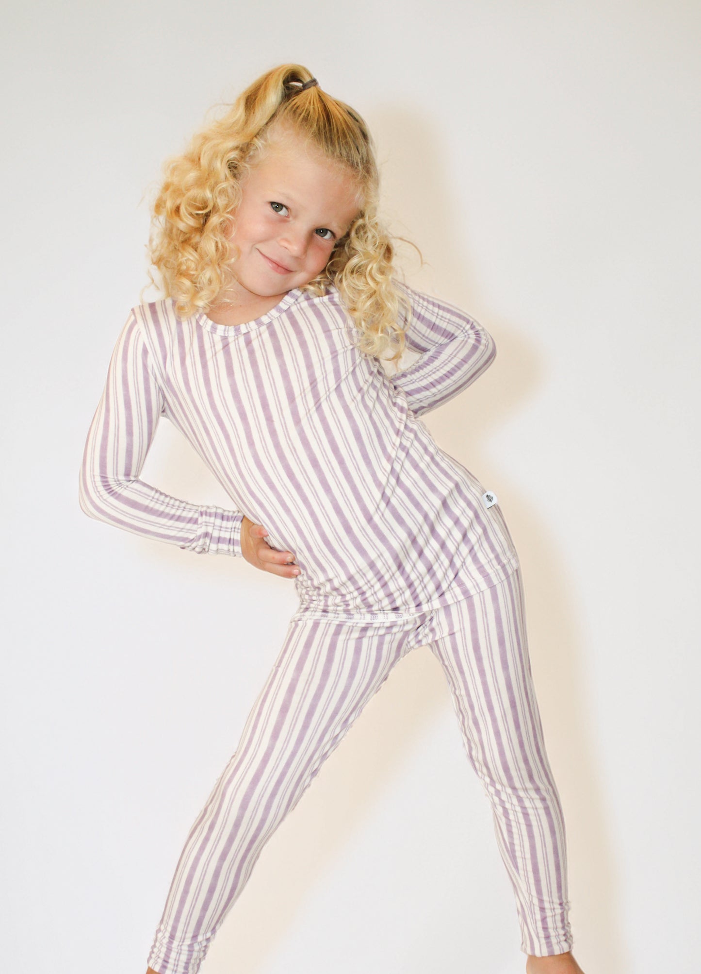 Luxury Green Haze bamboo toddler pajamas from Shae & Palmer’s Studio Stripe Collection, designed with sustainable bamboo fabric, a modern stripe print, and a comfortable two-piece style.