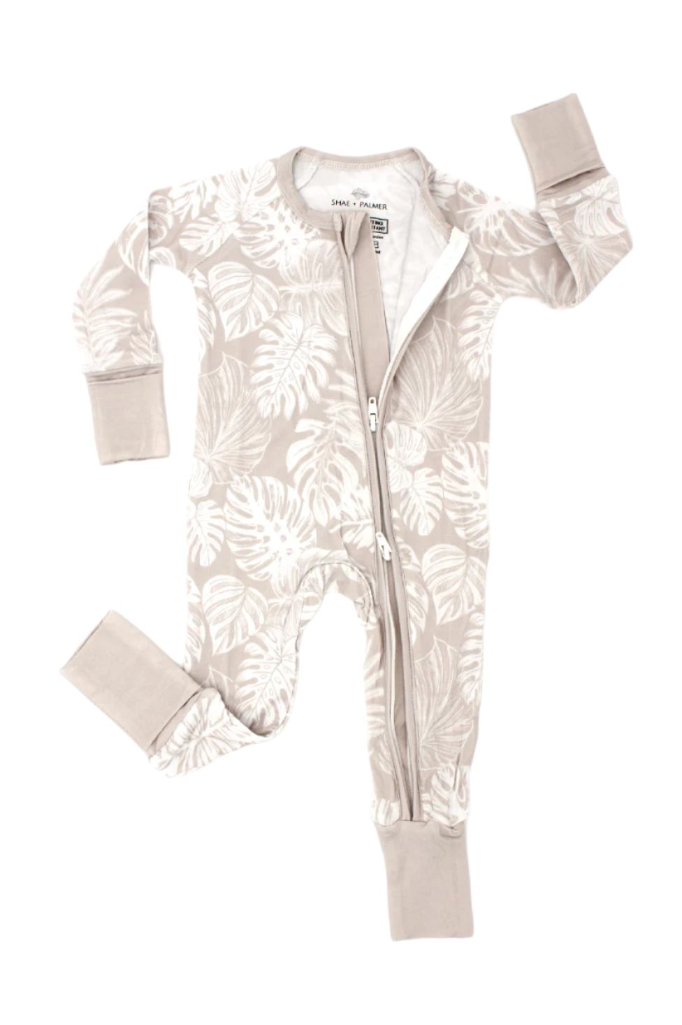 Shae & Palmer Tropical Bliss Collection - bamboo baby zip romper in Sandstone tropical floral print. Ultra-soft, breathable sleepwear with double zipper for easy diaper changes, perfect for baby girls in warmer weather