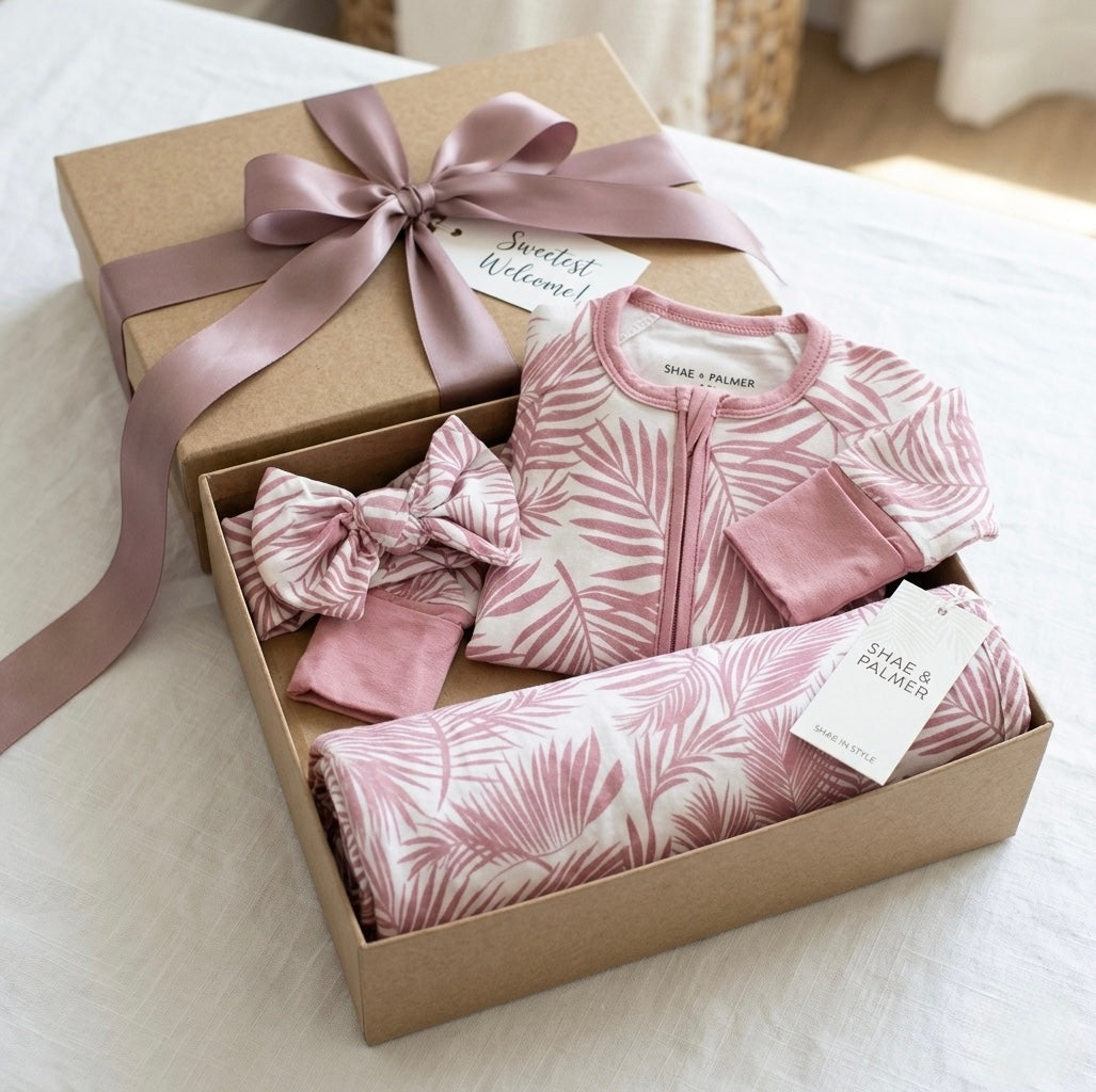 Shae and Palmer luxury bamboo baby pajama set with matching bow and lovey — soft, hypoallergenic sleepwear for newborns and infants