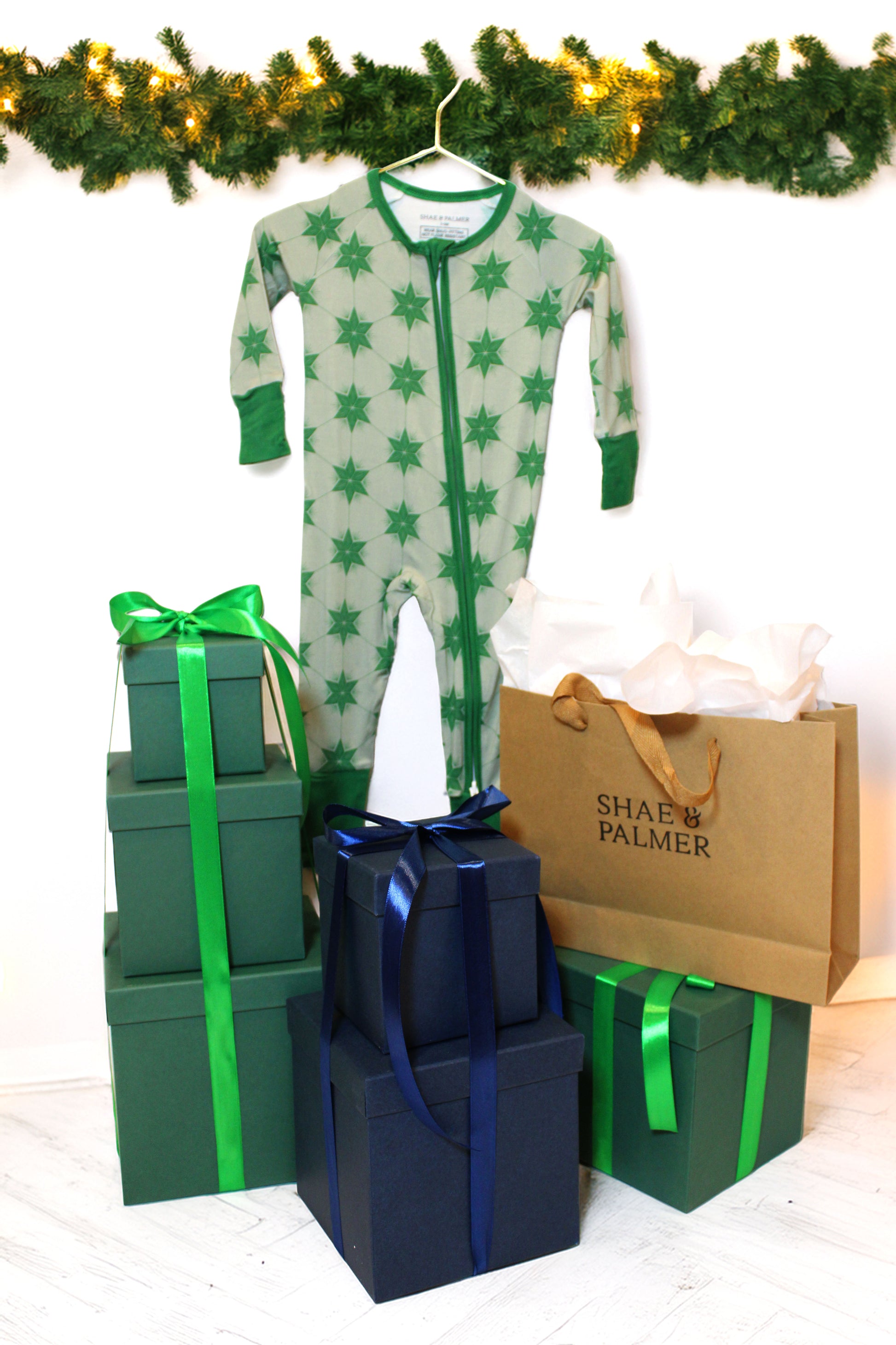 Evergreen bamboo baby pajamas from the Starry Night Collection by Shae & Palmer — breathable, stretchy, and perfect for festive winter mornings.