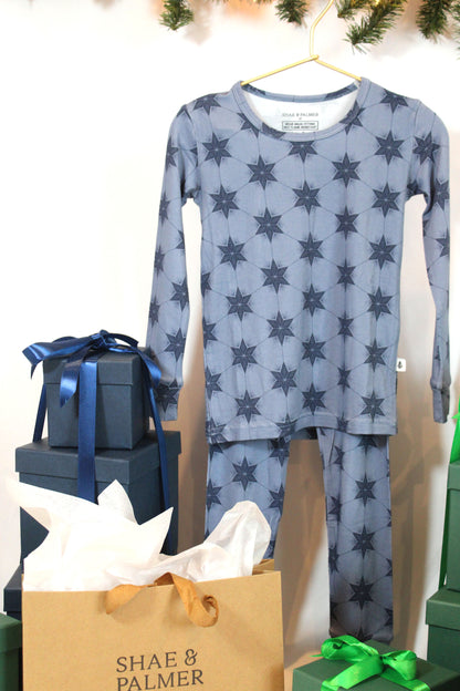 Luxury toddler Christmas pajamas in Polar Blue from Shae & Palmer’s Starry Night Collection — soft bamboo fabric for festive mornings and sweet dreams.