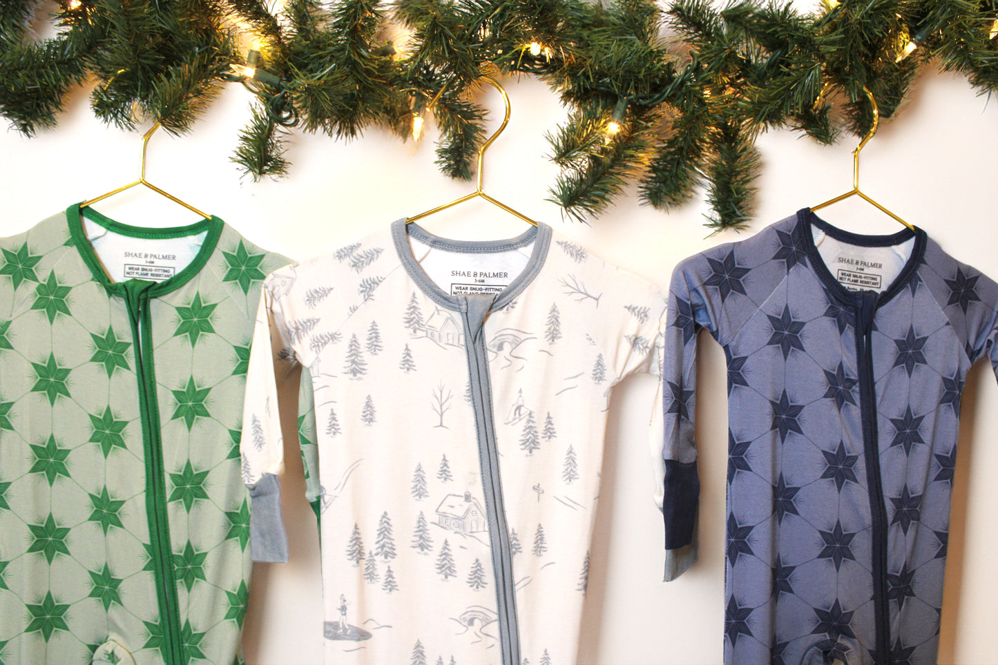 Bamboo baby PJs in Starry Night Polar Blue — buttery-soft and eco-friendly sleepwear by Shae & Palmer, made for festive winter celebrations. Chrstmas, winter, hanukkah