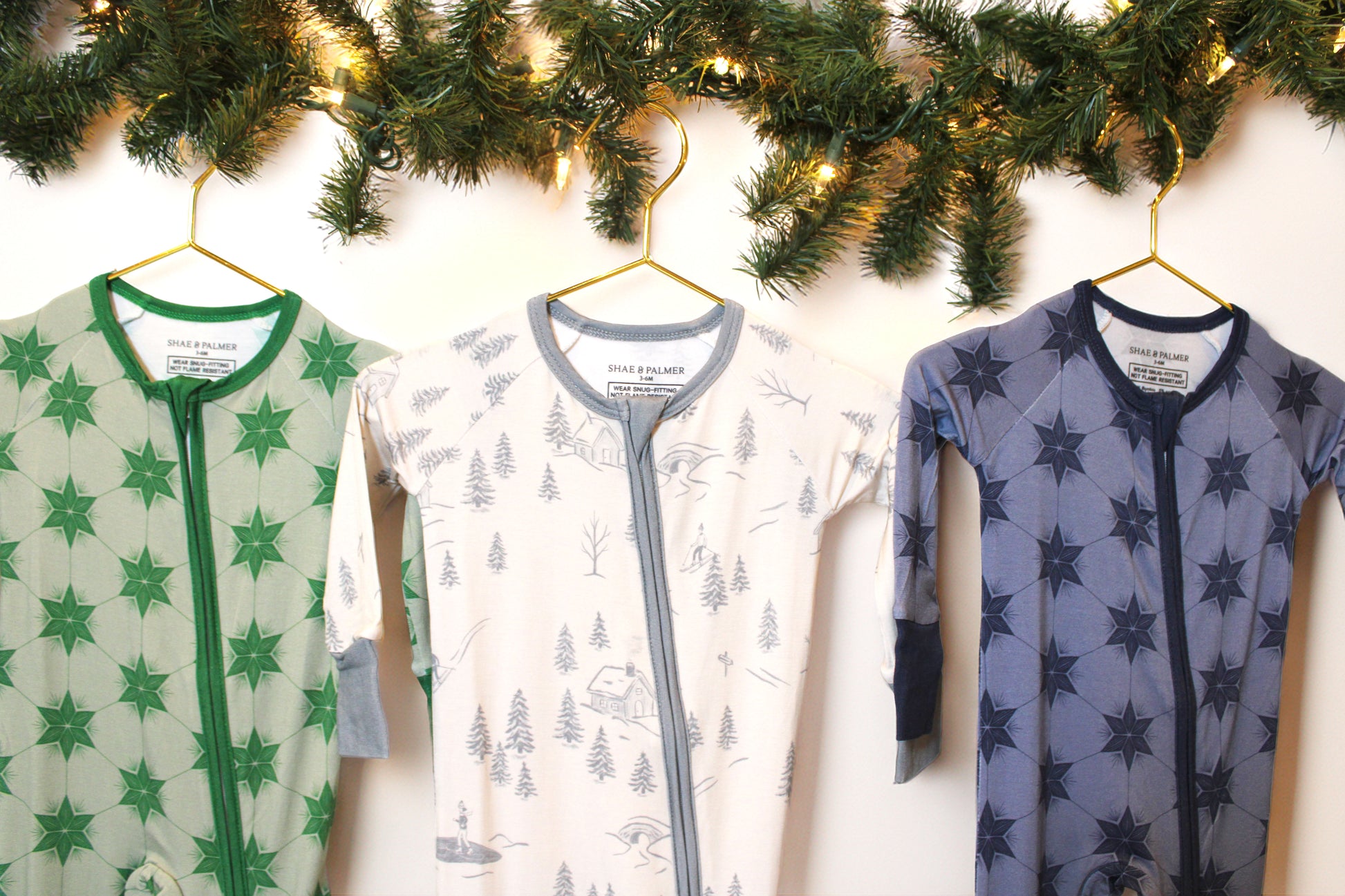 Bamboo baby PJs in Starry Night Polar Blue — buttery-soft and eco-friendly sleepwear by Shae & Palmer, made for festive winter celebrations. Chrstmas, winter, hanukkah