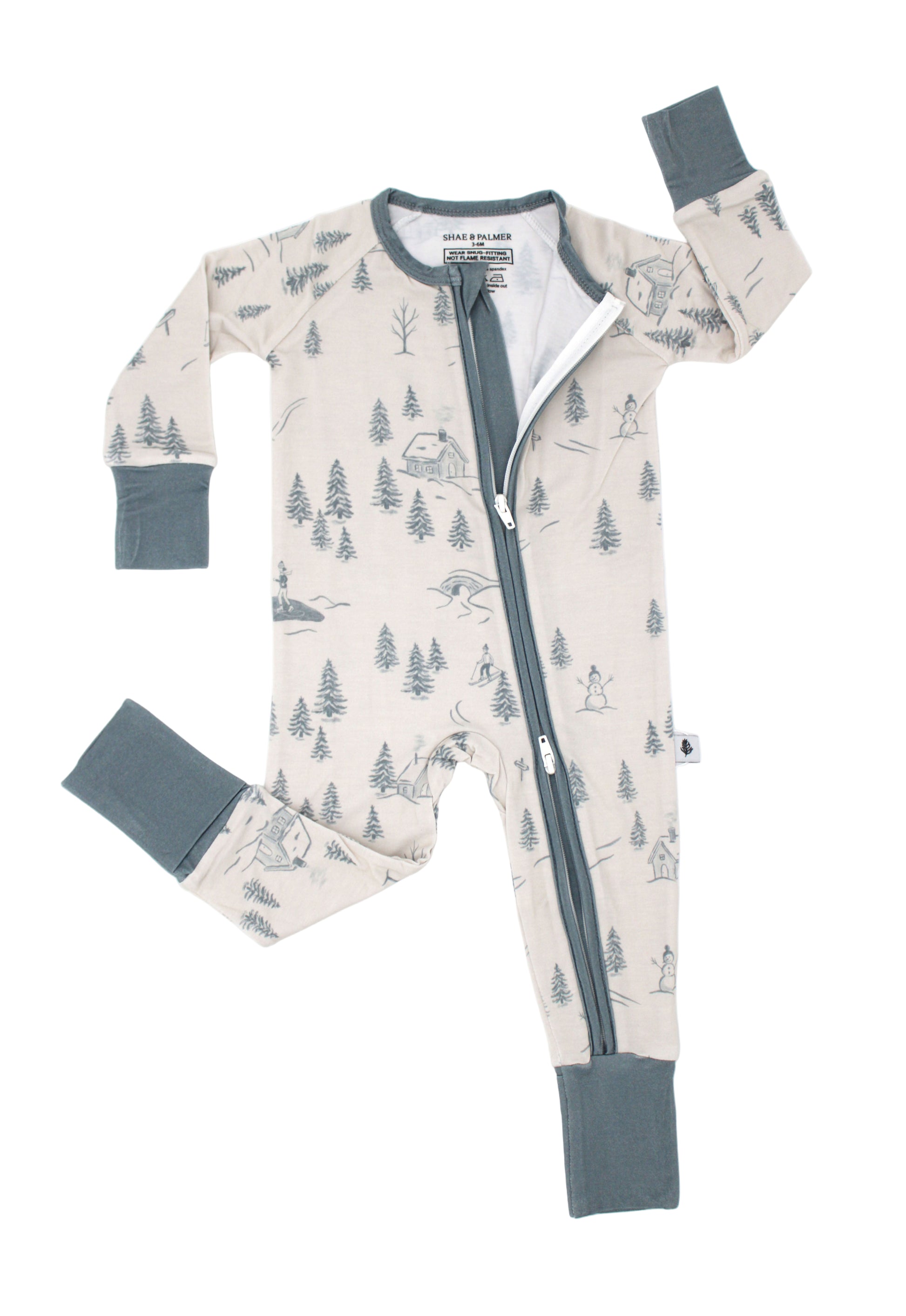 Adorable baby in Shae & Palmer Winterdream Christmas pajamas — eco-friendly bamboo PJs for cozy nights, festive photos, and soft holiday cuddles.