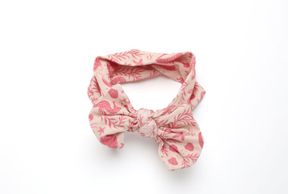 Baby wearing Mermaid Cove bamboo headband by Shae & Palmer, soft breathable ocean-inspired accessory