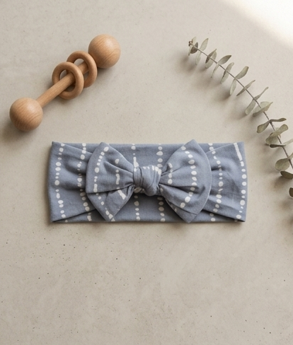 Blue Raspberry bamboo baby headband paired with matching baby pajamas