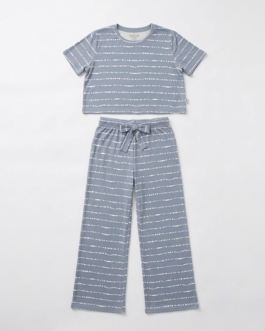 Women's Blue Raspberry Stripe bamboo pajama set displayed in a flat lay with a relaxed-fit top and pants in soft hand-painted blue stripes from the Market Fresh Collection by Shae & Palmer.