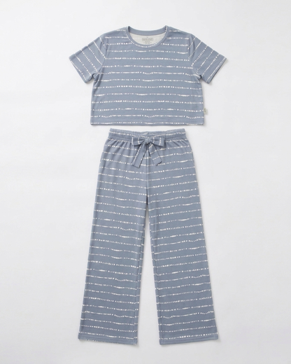 Women's Blue Raspberry Stripe bamboo pajama set displayed in a flat lay with a relaxed-fit top and pants in soft hand-painted blue stripes from the Market Fresh Collection by Shae & Palmer.