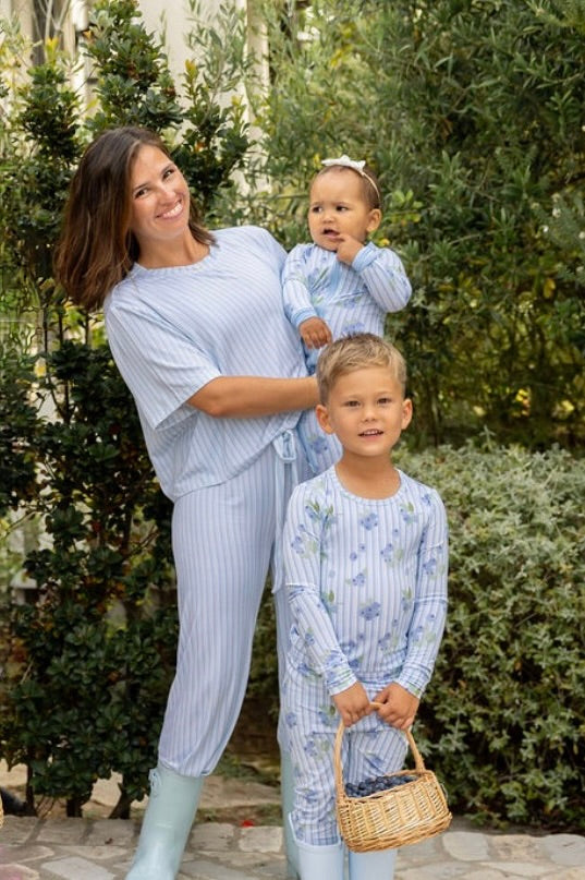 Mom, baby, and big kid boy in matching Blueberry stripe bamboo pajamas from Shae & Palmer's mommy-and-me Market Fresh collection.