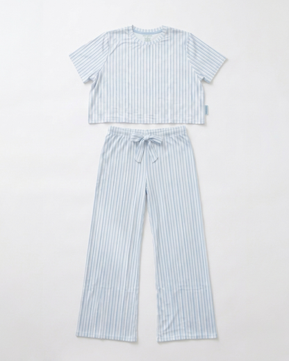 Women's Blueberry Stripes bamboo pajama set by Shae & Palmer featuring a soft blue striped short-sleeve top and matching wide-leg pants.