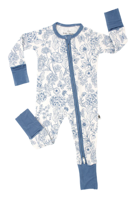 Shae & Palmer Botanical Blue bamboo baby romper featuring a soft blue floral print, double zipper for easy changes, and eco-friendly bamboo fabric.