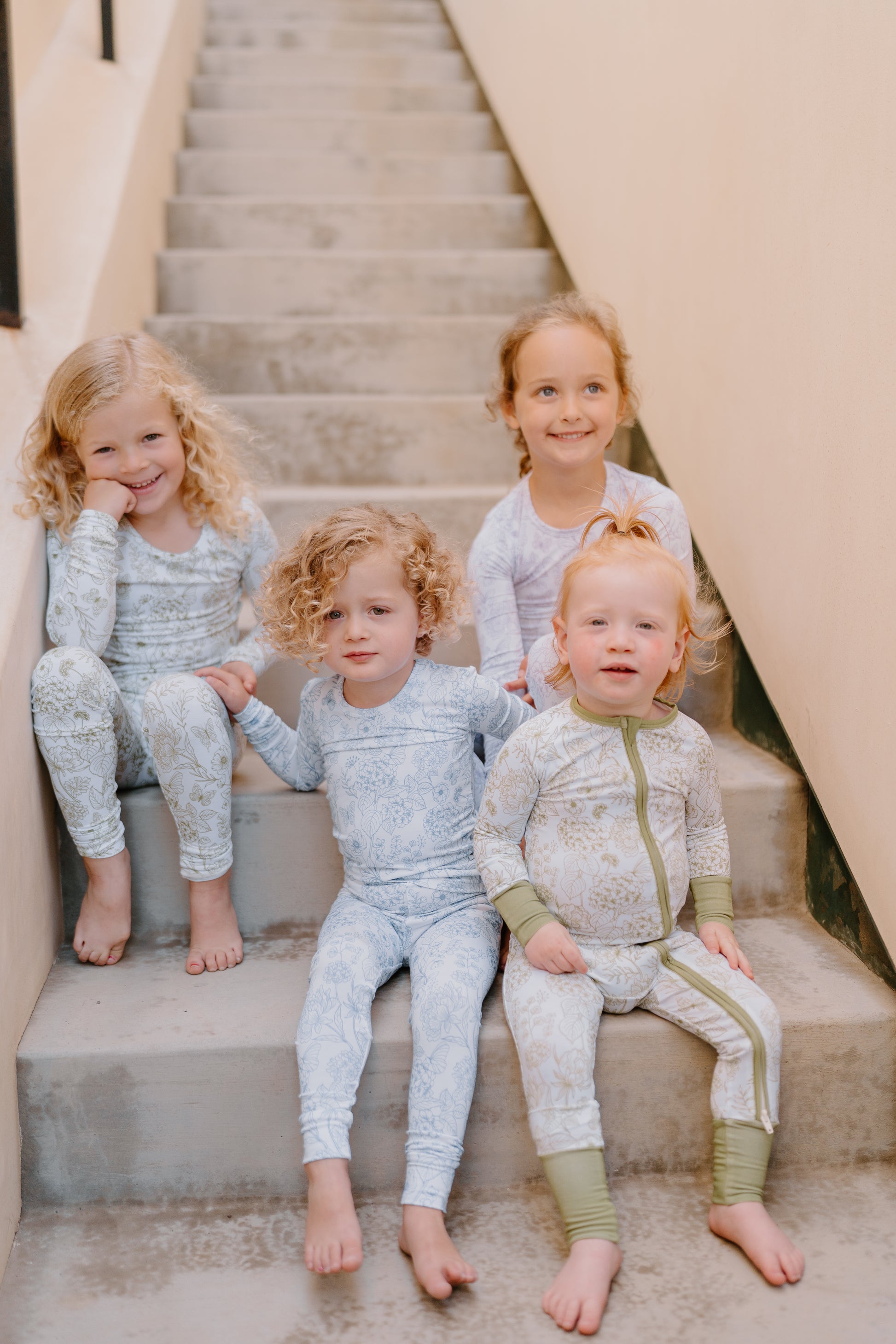Shae & Palmer Botanical Collection-bamboo baby and toddler pajamas in soft floral prints, available in Amethyst purple, Moss green, and Infinity blue. Breathable, ultra-soft sleepwear designed for girls who love to play, rest, and dream in comfort.