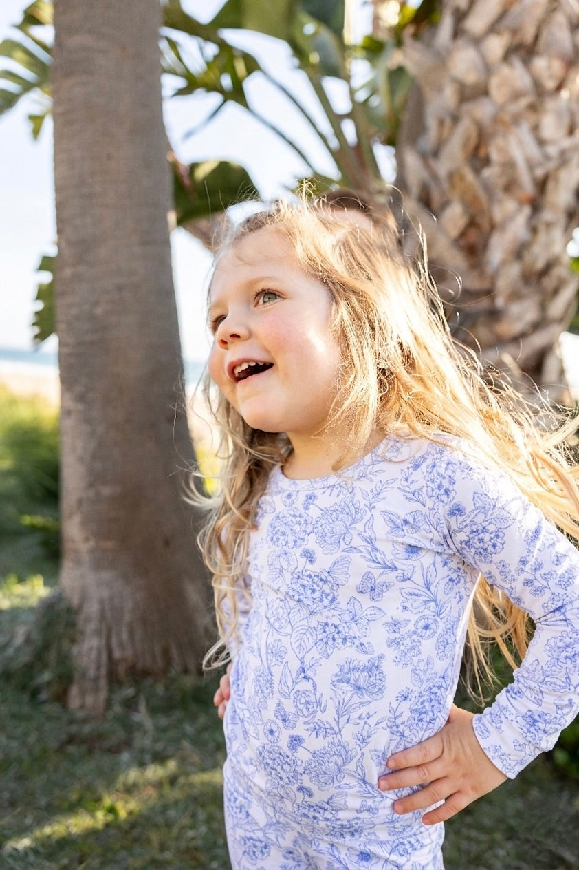 Shae & Palmer Botanical Blue toddler bamboo pajama set featuring refined blue botanical details, stretchy bamboo fabric, and a cozy fitted two-piece design.
