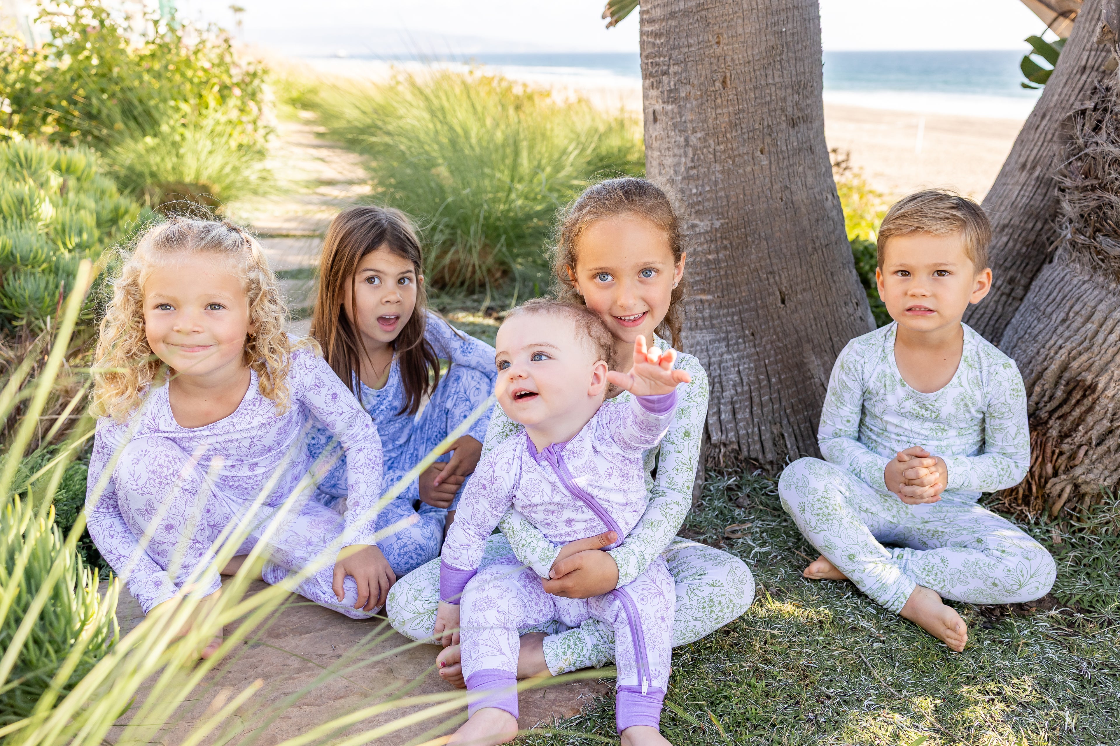Shae & Palmer Botanical Collection bamboo pajamas featuring elegant floral prints in soft blue, green, and lavender tones crafted from ultra-soft breathable bamboo fabric for babies, toddlers, and big kids.