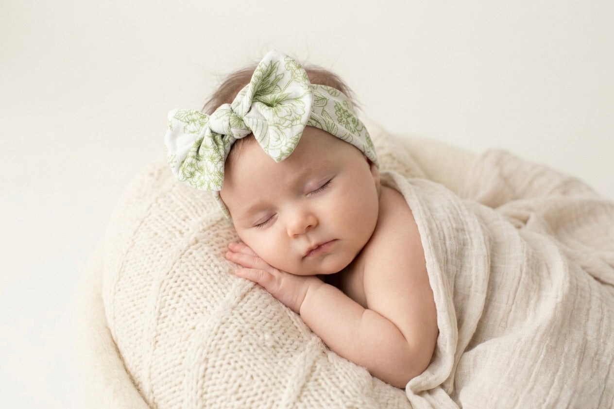 Botanical Moss Green bamboo baby headband by Shae & Palmer with floral print, soft stretchy fabric