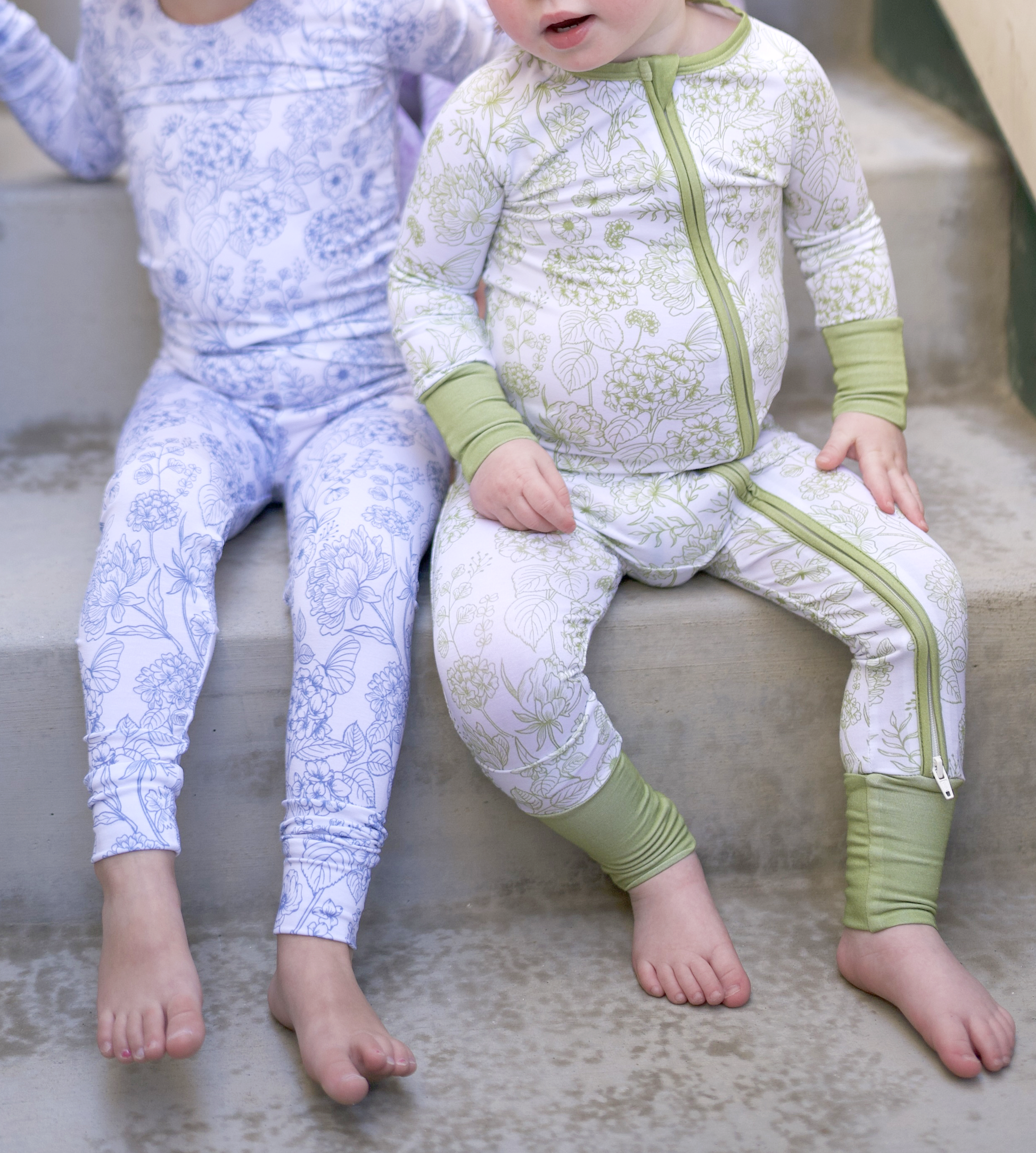 Shae & Palmer Botanical Collection -  bamboo baby zip romper in Moss Green floral print. Soft, breathable zip-up pajamas with double zipper for easy diaper changes, perfect for cozy, stylish baby sleepwear.
