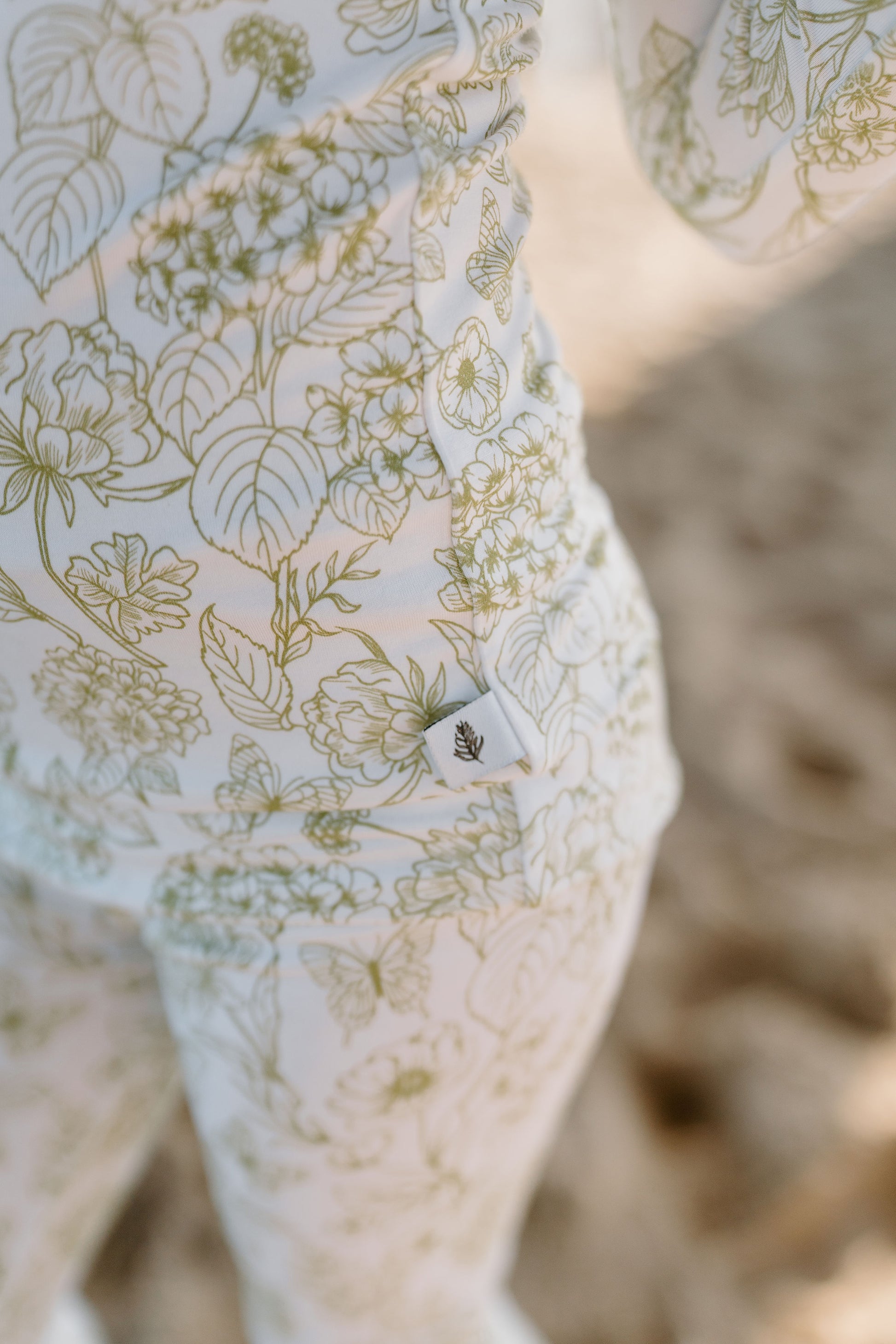 Shae & Palmer bamboo kids two-piece sleepwear in Botanical Moss Green offers a premium, sustainable choice for parents, with a soft floral print, long sleeves, and breathable bamboo fabric for year-round wear.