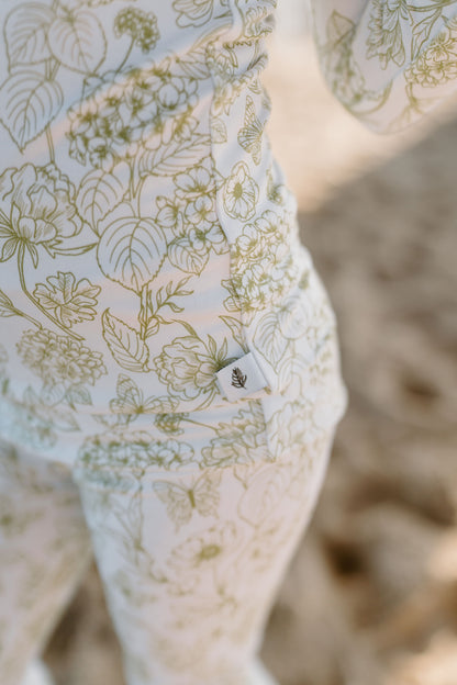Shae & Palmer bamboo kids two-piece sleepwear in Botanical Moss Green offers a premium, sustainable choice for parents, with a soft floral print, long sleeves, and breathable bamboo fabric for year-round wear.