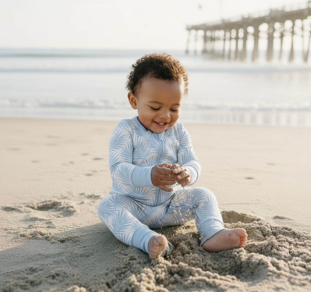 Cali Coastal Baby Blue bamboo baby romper with double zipper design for easy diaper changes, soft and functional baby sleepwear
