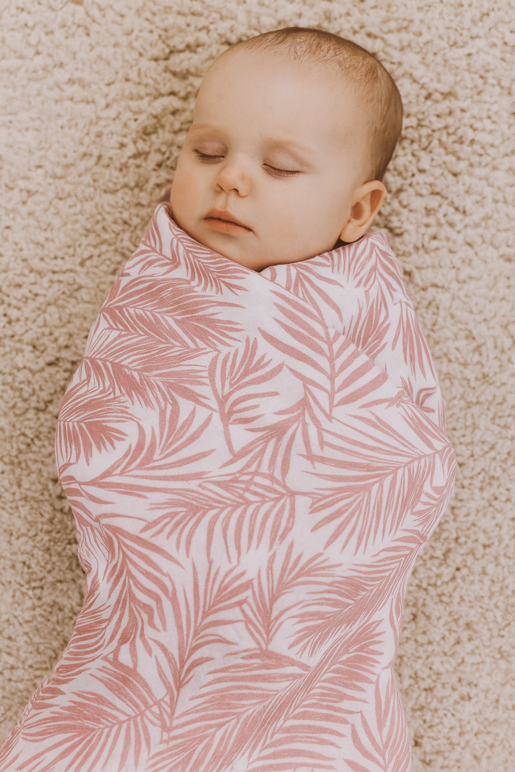 Cali Coastal Pink bamboo baby blanket by Shae & Palmer with palm leaf print, ultra-soft breathable 46x46 swaddle