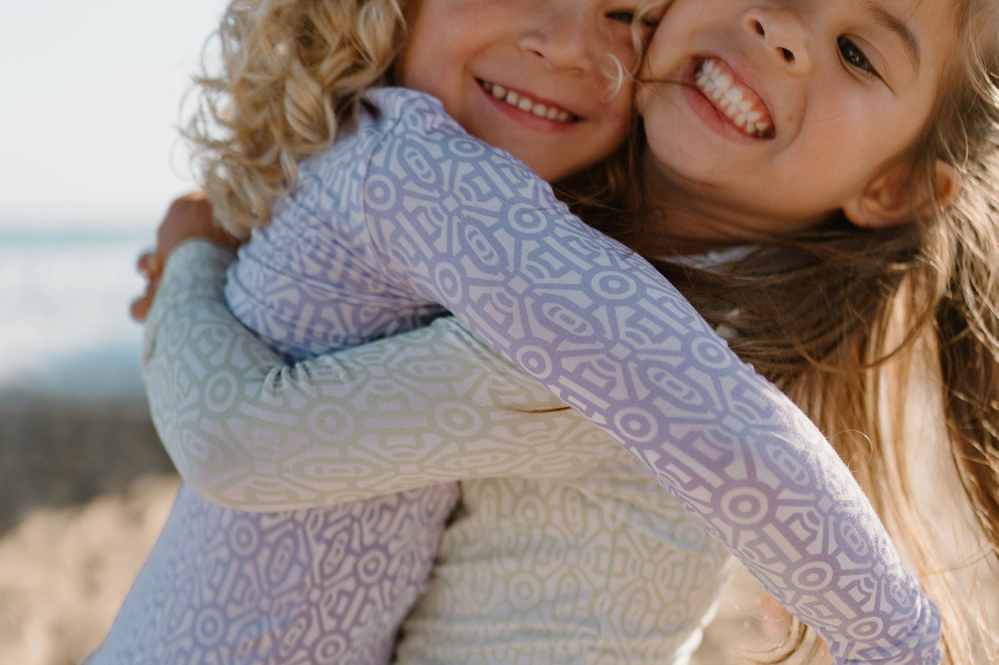 Gemstone Collection bamboo pajama set for kids in a stylish two-piece design, offering buttery-soft fabric, sustainable materials, and a unique gemstone-inspired pattern for comfort and style.