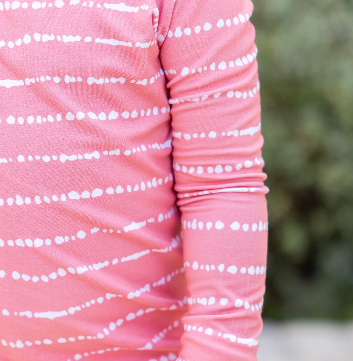 Close-up of Watermelon Blush Stripe print on soft, breathable bamboo pajama fabric
