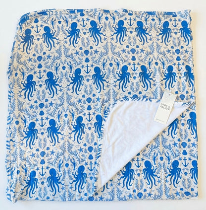 Hidden Ocean Treasures 46x46 bamboo swaddle blanket in coastal blue, lightweight and breathable with ocean-inspired print.