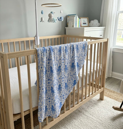 Shop the hidden ocean treasures bamboo baby blanket by Shae & Palmer. Ultra-soft, breathable 46x46 bamboo swaddle blanket lightweight, temperature-regulating, and perfect for swaddling, stroller rides, beach days, and everyday snuggles. Luxury bamboo baby blanket for newborns and toddlers.