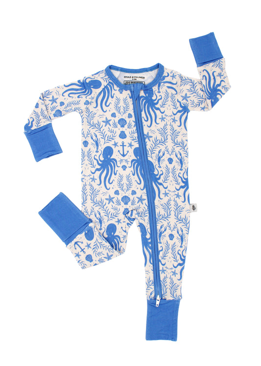 Hidden Ocean Treasures bamboo baby pajamas in soft ocean blue featuring octopus, seashells, and anchor print by Shae & Palmer