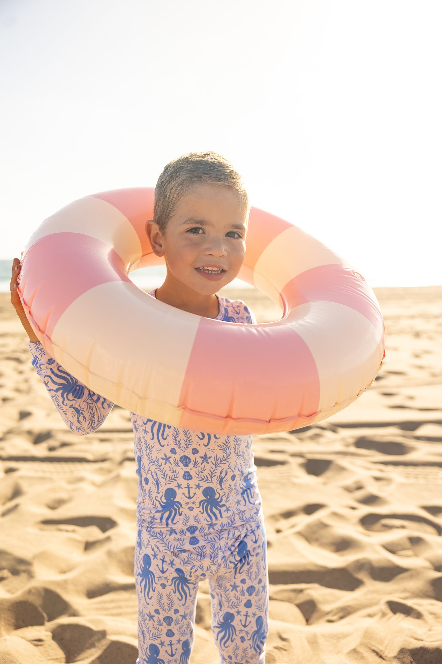 Soft blue bamboo pajamas for big kids with underwater ocean print including seashells, anchors, and octopus details by Shae & Palmer