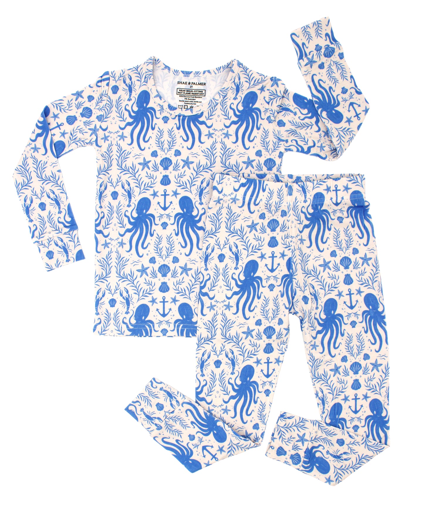 toddler wearing Shae & Palmer Hidden Ocean Treasures bamboo pajamas with whimsical underwater ocean print in breathable bamboo fabric