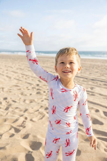 Bamboo toddler pajamas in Lobster Splash print. Soft, breathable, stretchy two-piece set with temperature-regulating fabric for comfortable sleep and play.