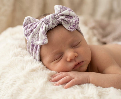 Luxury bamboo baby headband by Shae & Palmer in Botanical Amethyst Purple with delicate floral pattern.