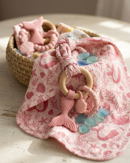 Luxury bamboo baby lovey by Shae & Palmer in the Mermaid Cove print featuring playful mermaids and seaside details.