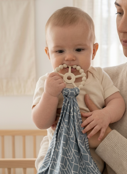 Luxury bamboo baby lovey with pacifier holder in the Shae & Palmer Runway geometric pattern.