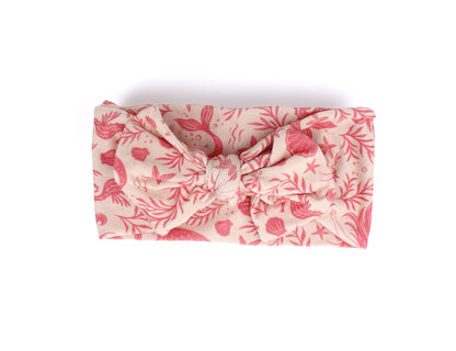 Soft stretchy fit of Mermaid Cove bamboo baby headband by Shae & Palmer, gentle and comfortable on skin