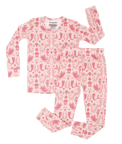 Shae & Palmer coastal-inspired toddler pajamas in blush mermaid pattern, modern and design-forward.