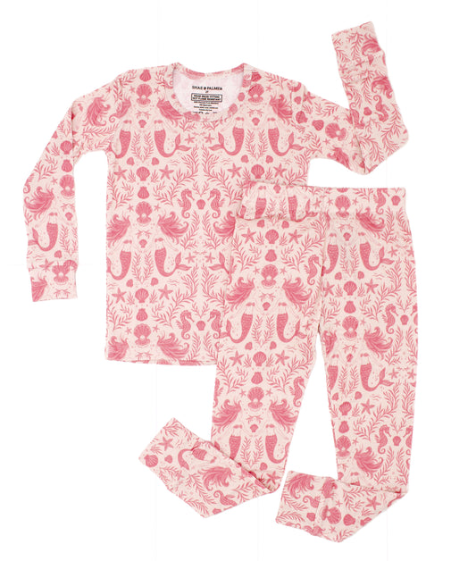 Shae & Palmer coastal-inspired toddler pajamas in blush mermaid pattern, modern and design-forward.