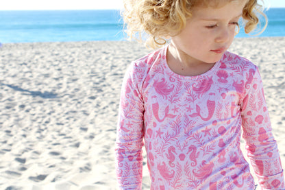 Luxury toddler bamboo sleepwear in Mermaid Cove print, breathable and temperature-regulating fabric.