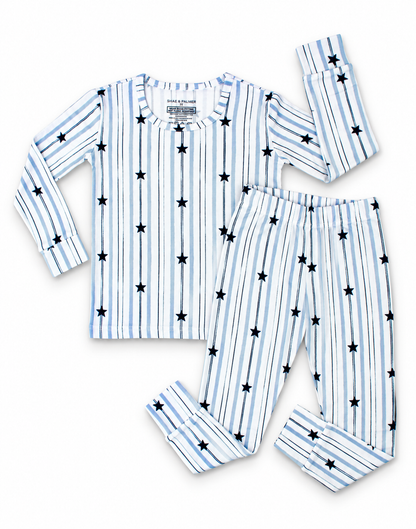 North Star bamboo big kids pajamas by Shae & Palmer featuring navy stars on soft blue and white stripes. Comfortable, breathable Christmas and Hanukkah pajamas perfect for matching family holiday sets, sibling sleepwear, festive photos, and cozy winter nights.