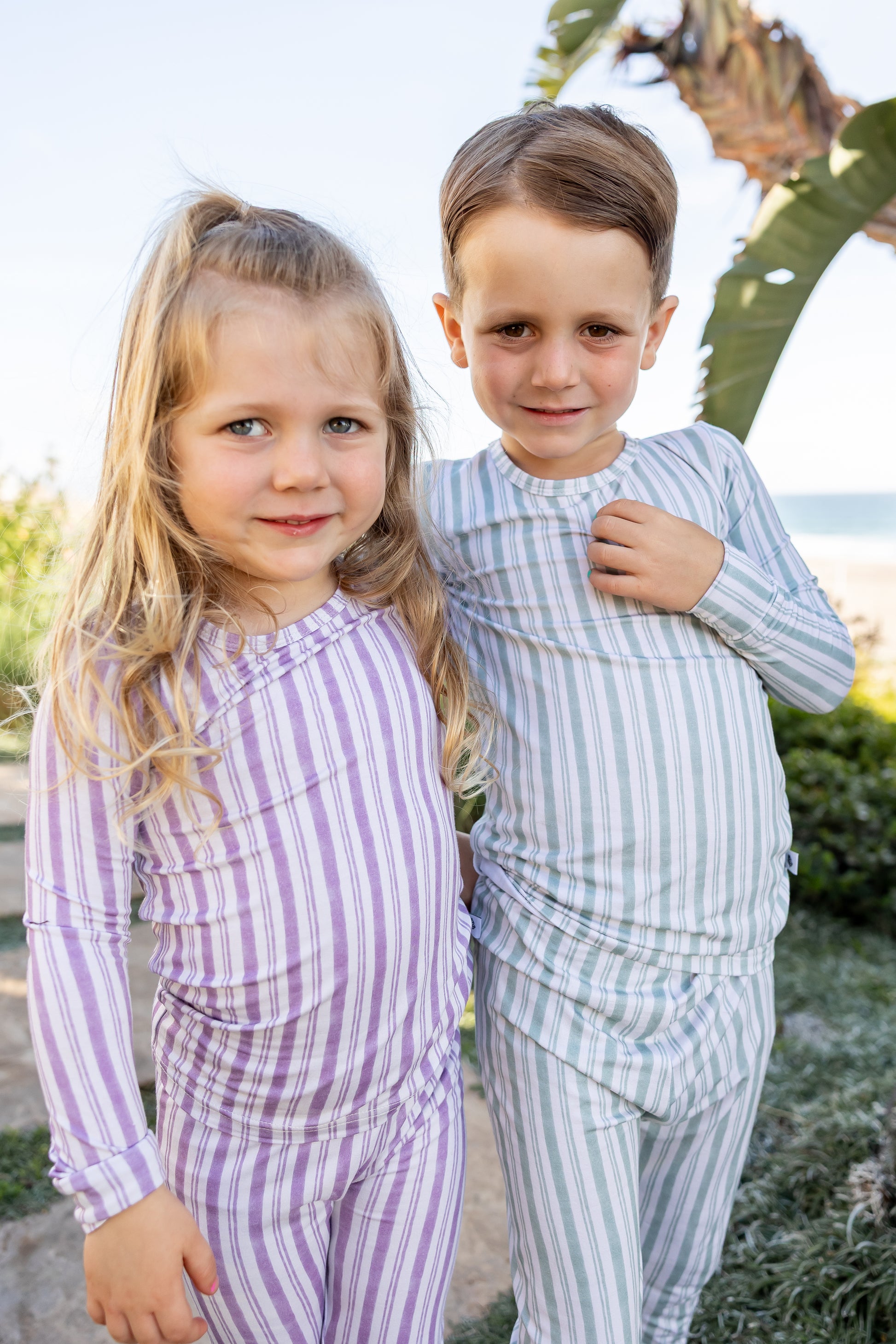Shae & Palmer Purple Haze Studio Stripe toddler bamboo pajama set featuring hand-painted purple stripe details, buttery-soft stretch bamboo fabric, and a comfortable fitted silhouette.