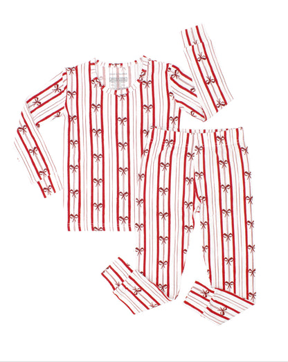 Ribbon Stripe bamboo big kids pajamas by Shae & Palmer featuring timeless red and ivory stripes with delicate bows. Comfortable, breathable Christmas pajamas for big kids, perfect for matching family holiday pajamas, coordinating sibling sleepwear, Christmas morning traditions, and festive holiday photos.
