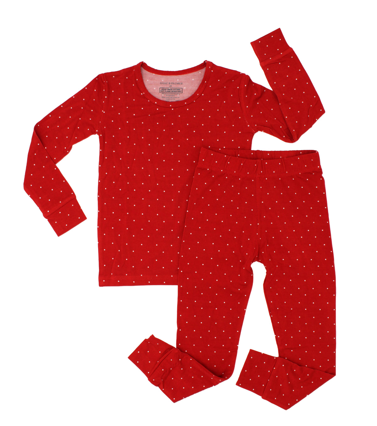 Ruby Dot Christmas big kid bamboo pajamas by Shae & Palmer featuring a timeless red dot holiday print and ultra-soft, breathable bamboo fabric. Festive Christmas pajamas for big kids, perfect for matching family Christmas pajamas, coordinating sibling sleepwear, holiday family photos, and cozy Christmas morning celebrations.